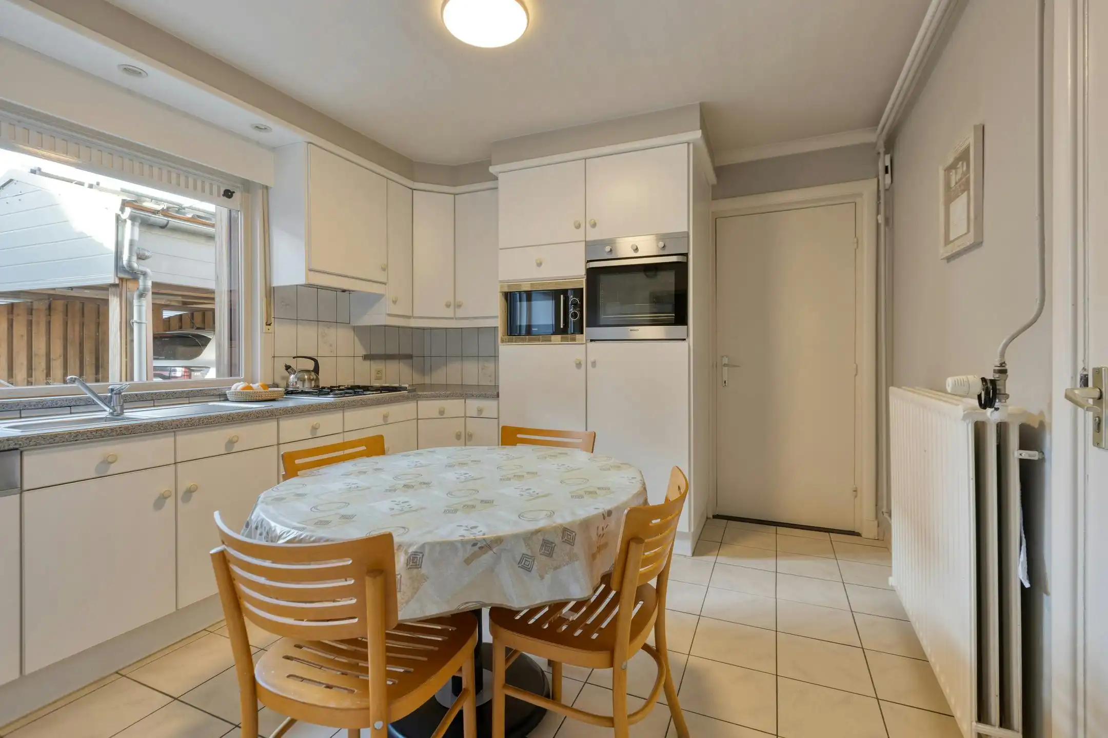 Zeer goed onderhouden handelshuis met handelsruimte en magazijn in centrum Overpelt te koop foto 9