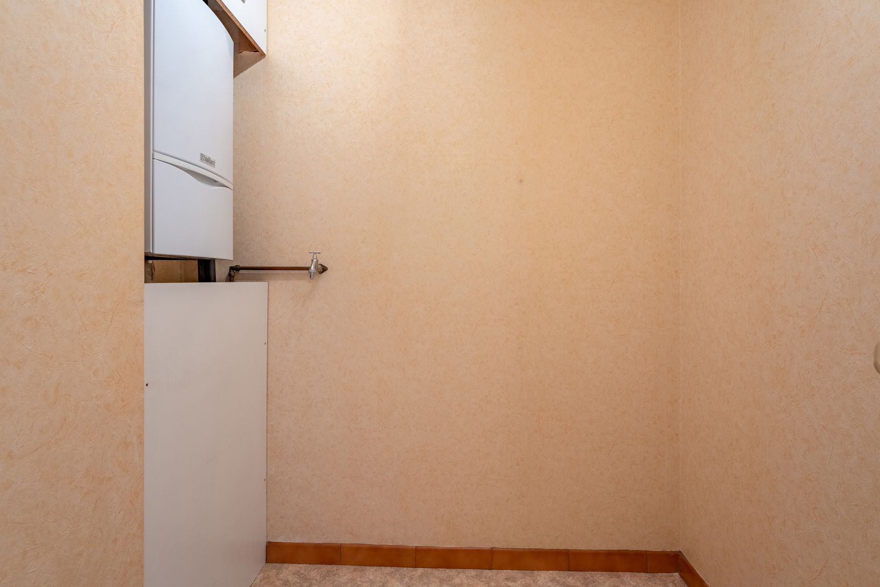 Verzorgd appartement op de gelijkvloerse verdieping met garagebox! foto 11