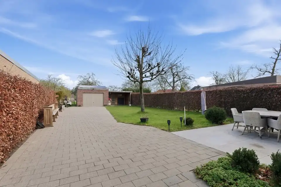 Instapklare gezinswoning met 3 slaapkamers en ruime tuin en garage in Tongeren foto 4