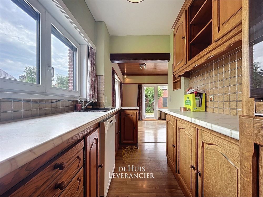 Een huis met potentieel in een buurt met toekomst ! foto 10