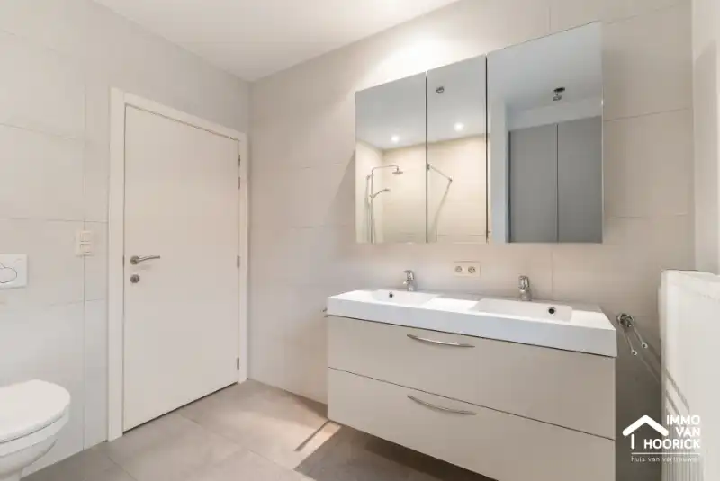 Prachtig instapklaar gelijkvloers appartement met tuin! foto 12
