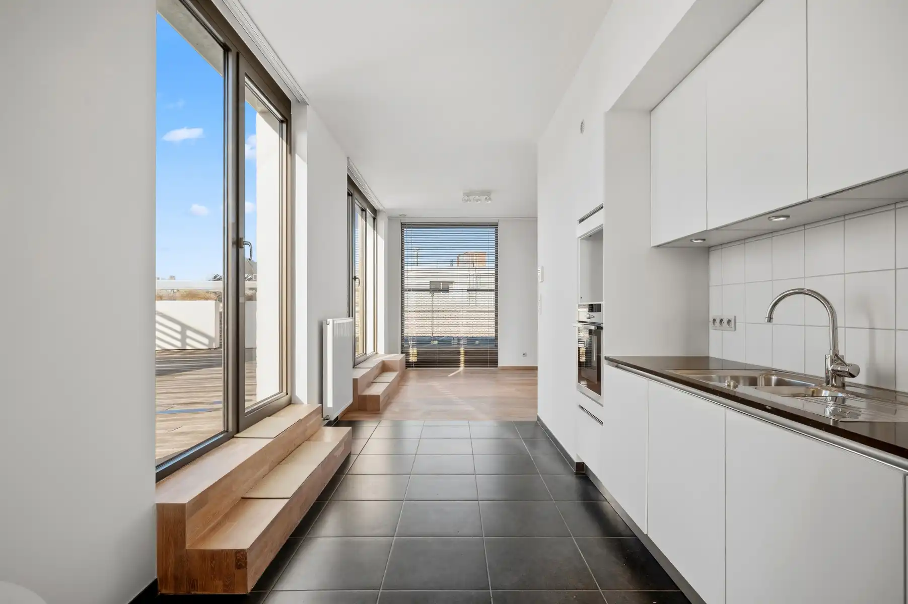Penthouse met heerlijk terras in het gegeerde Clarenhof foto 3