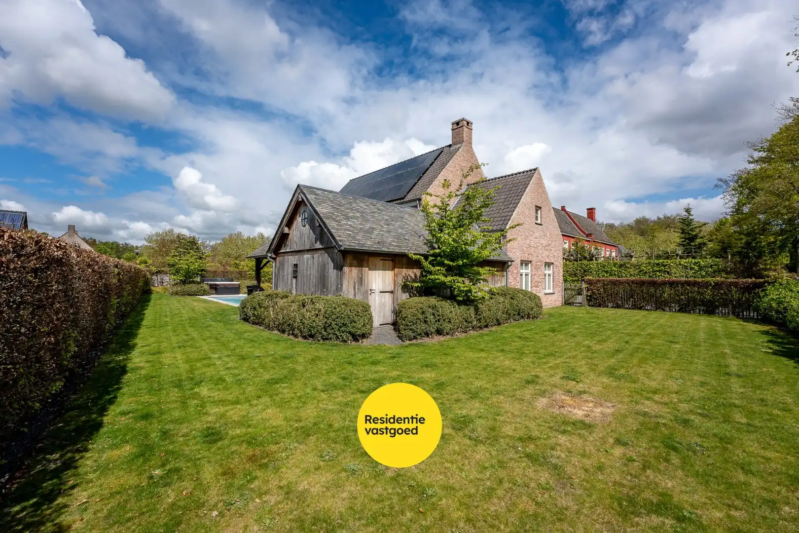 Exclusieve villa met zwembad en poolhouse in de nieuwe St-Annawijk te Sint-Andries foto 29