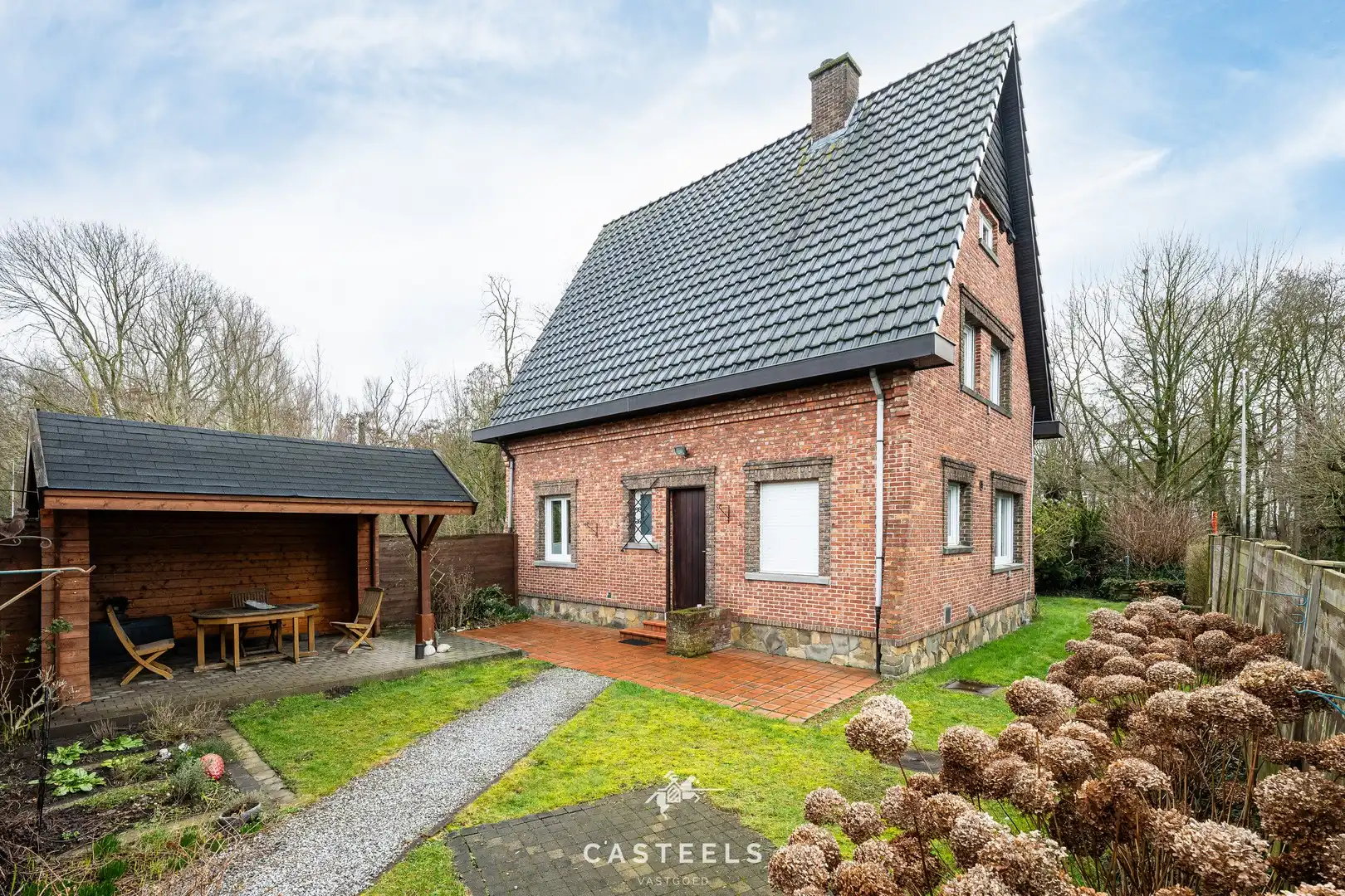 Ruime gezinswoning met zonnige tuin te koop in Lokeren foto 27