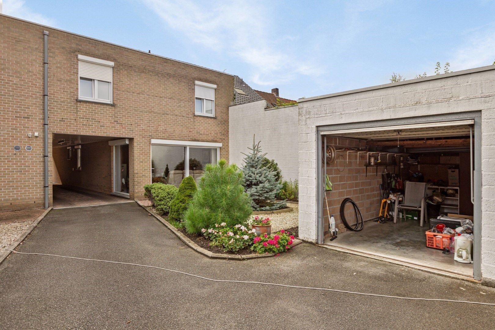 Heel aangenaam, lichtrijk gelijkvloers appartement met tuin én garage! foto 21