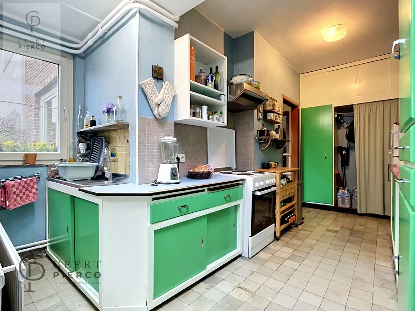 Op te frissen rijwoning gelegen aan de stadsrand van Landen. foto 9