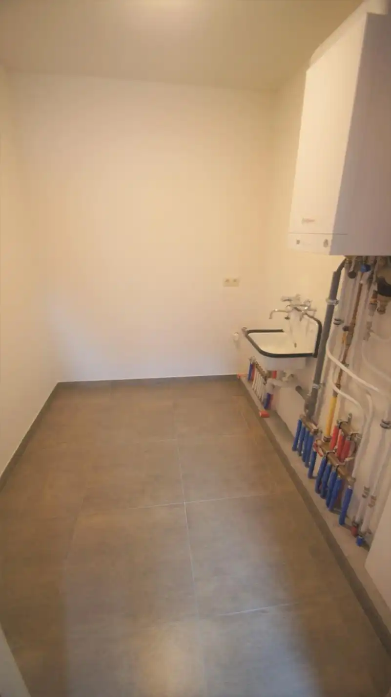 Energiezuinig duplexapp. met 2 slpks, terras en autostaanplaats foto 15