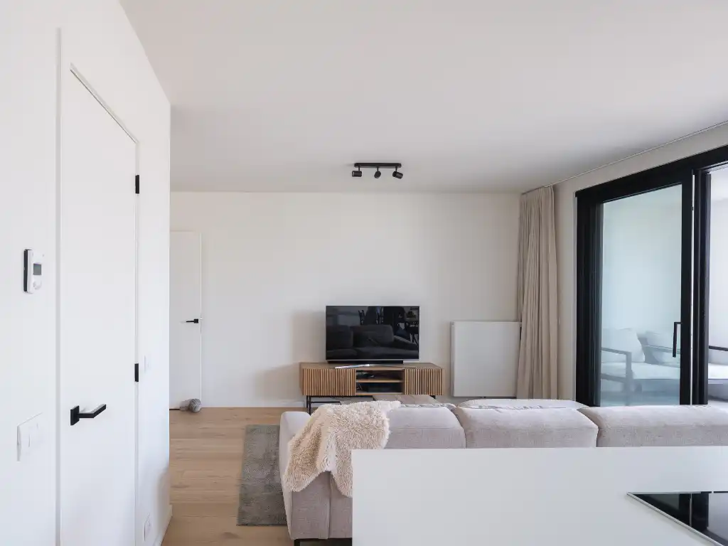 Lichtrijk appartement met twee volwaardige slaapkamers en zonneterras nabij het Baudelopark. foto 9