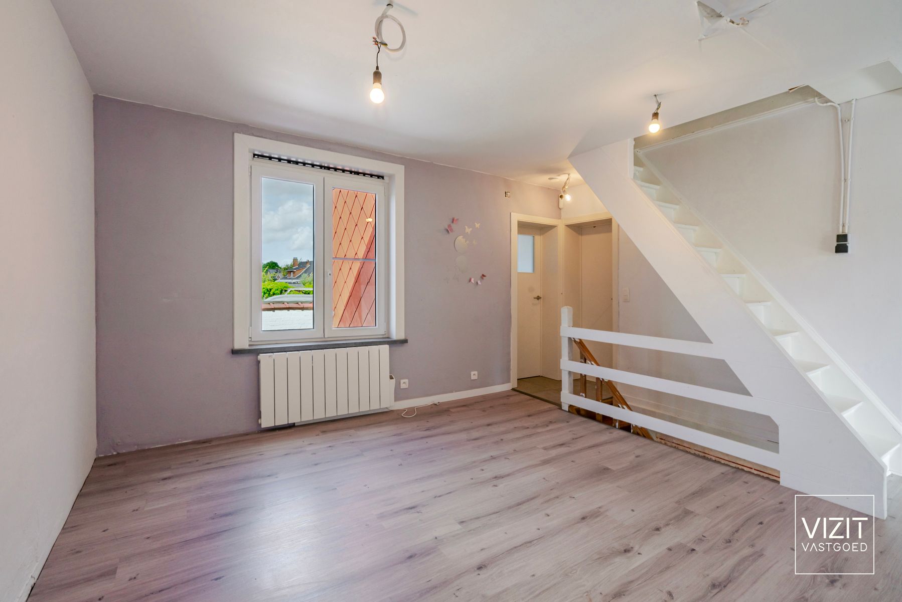 Zeer ruime halfopen woning aangename tuin foto 12