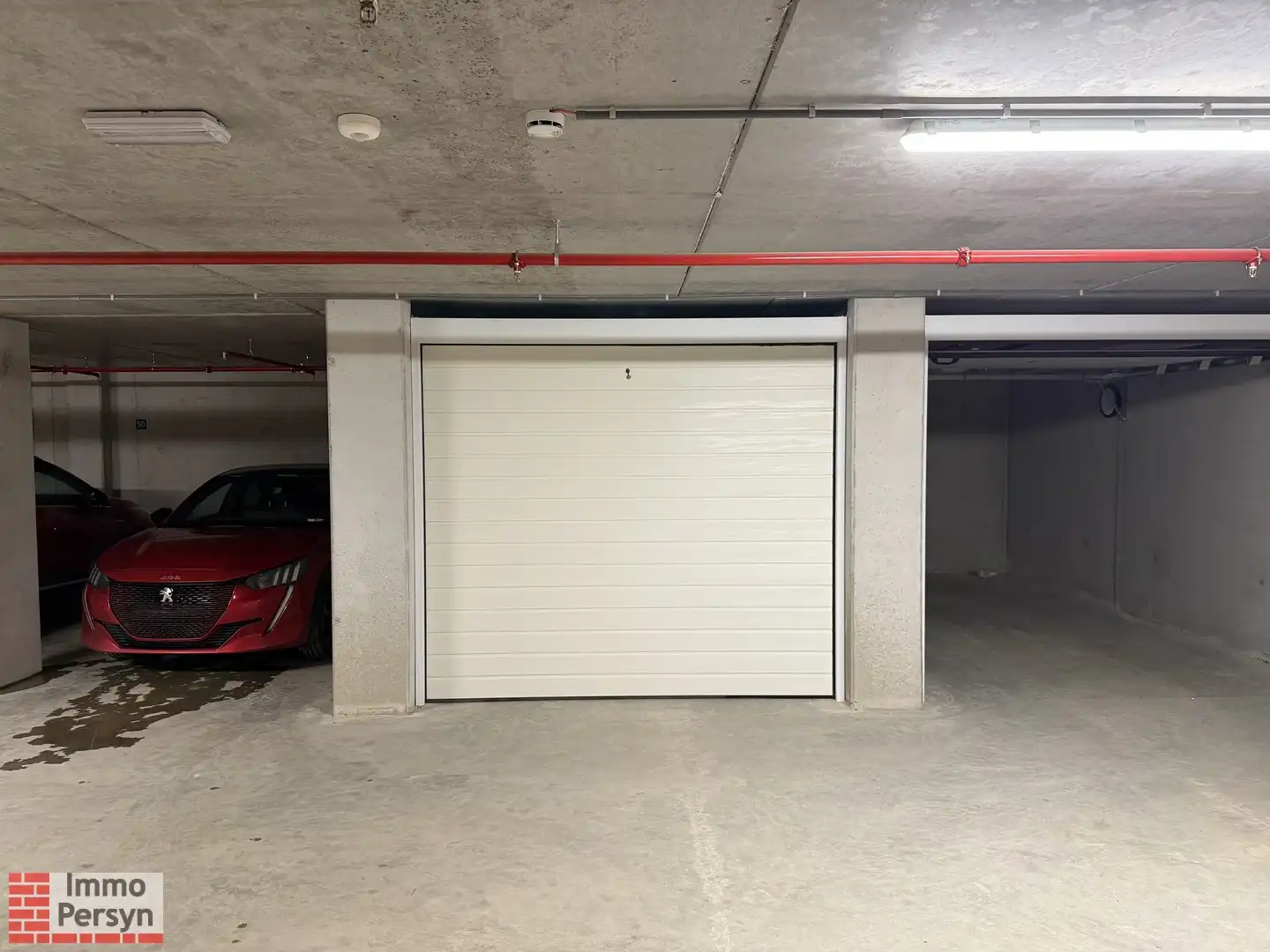 Nieuwbouw garagebox met automatische poort in hartje Scherpenheuvel foto 2