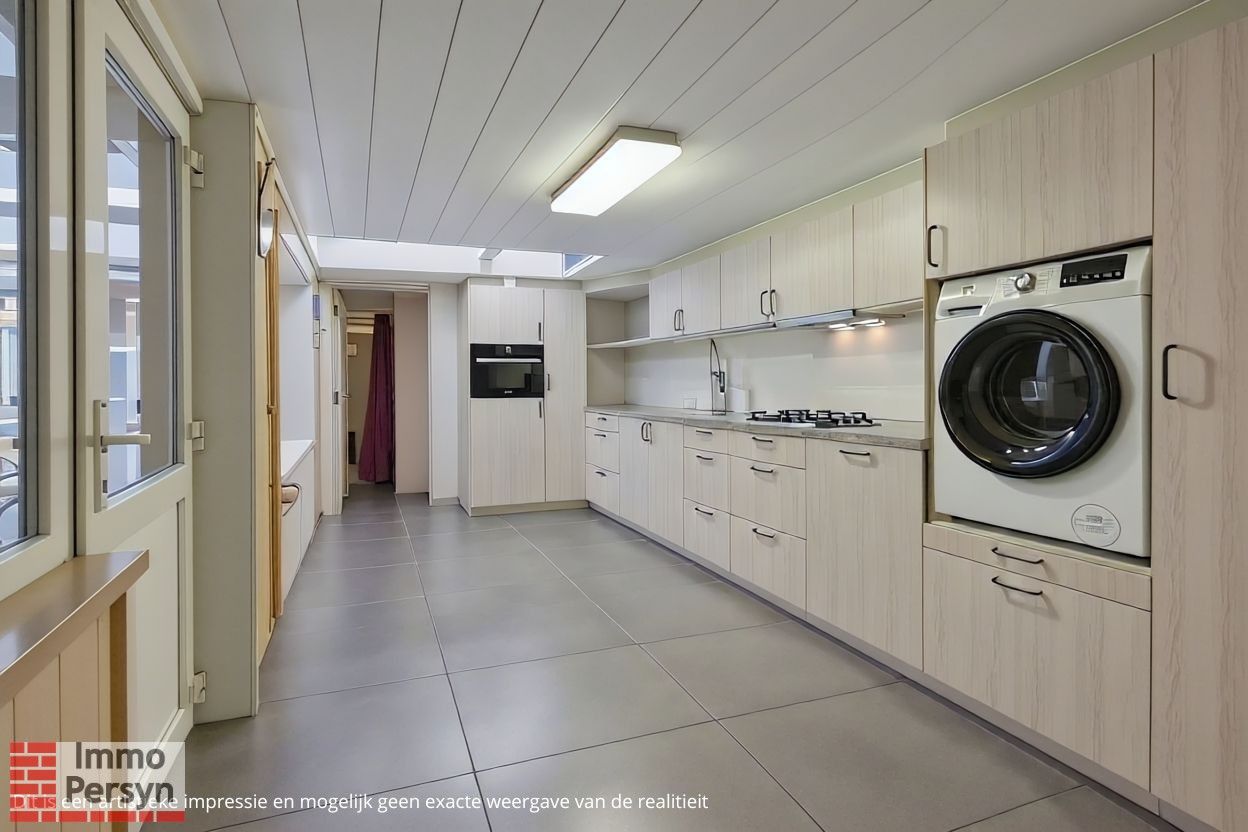 Charmante te moderniseren woning met nieuwe keuken op toplocatie in Scherpenheuvel-Zichem foto 8