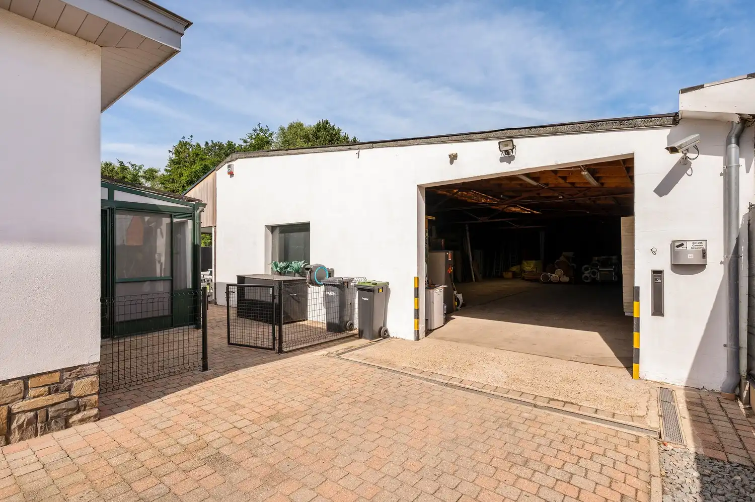 Ruime, degelijke gezinswoning met magazijn op een perceel van 930 m². foto 34
