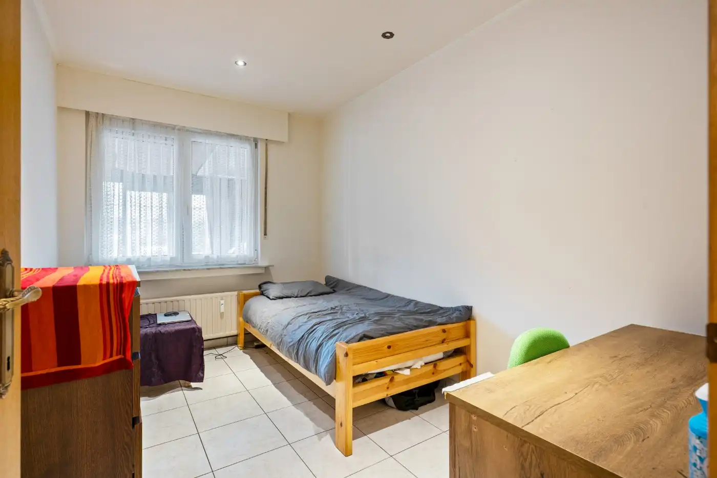 Gelijkvloers appartement met 2 slpk., veranda, verhard tuintje en garage foto 9