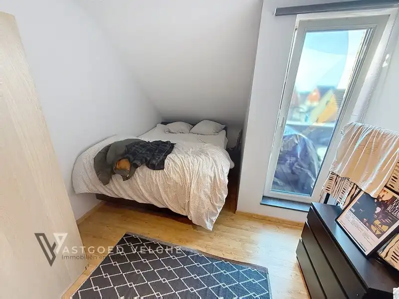 Te koop Eigentijds dakappartement van 89m² op centrale ligging met ruime zolder van maar liefst 30m² en garagebox van 20m² foto 18