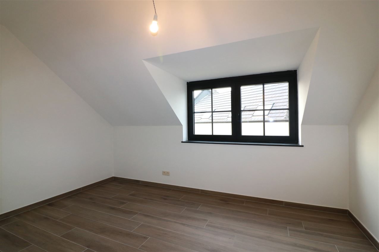 Unieke duplex met twee slpk, terras, autostaanplaats, label A foto 18