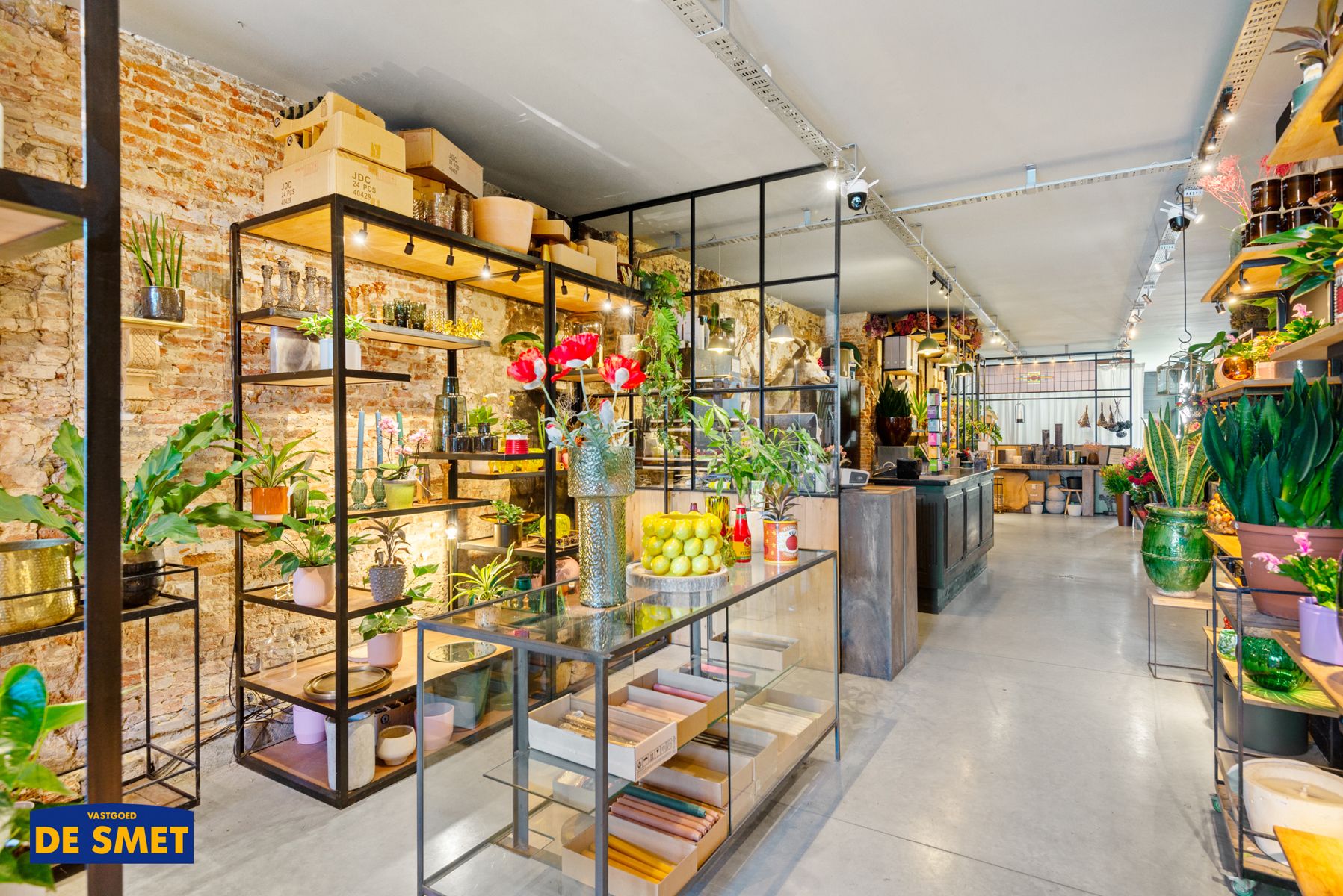Polyvalente handelsruimte met tuin en triplex pal in centrum foto 4