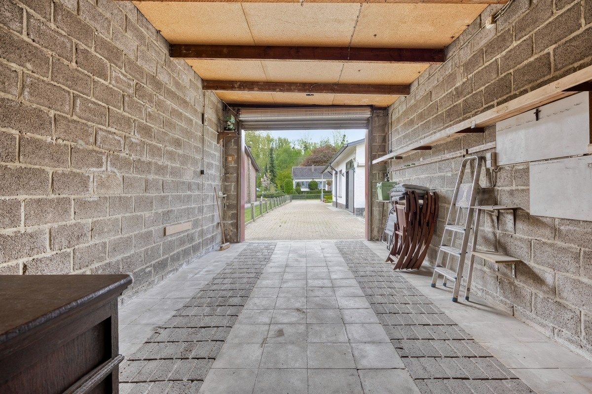 Ruime gelijkvloerse woning met zeer grote garage en leuke tuin te Tongeren  foto 26