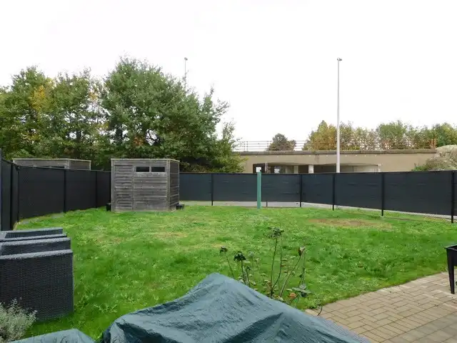 Rustig gelegen gelijkvloers appartement met tuin en carport foto 14