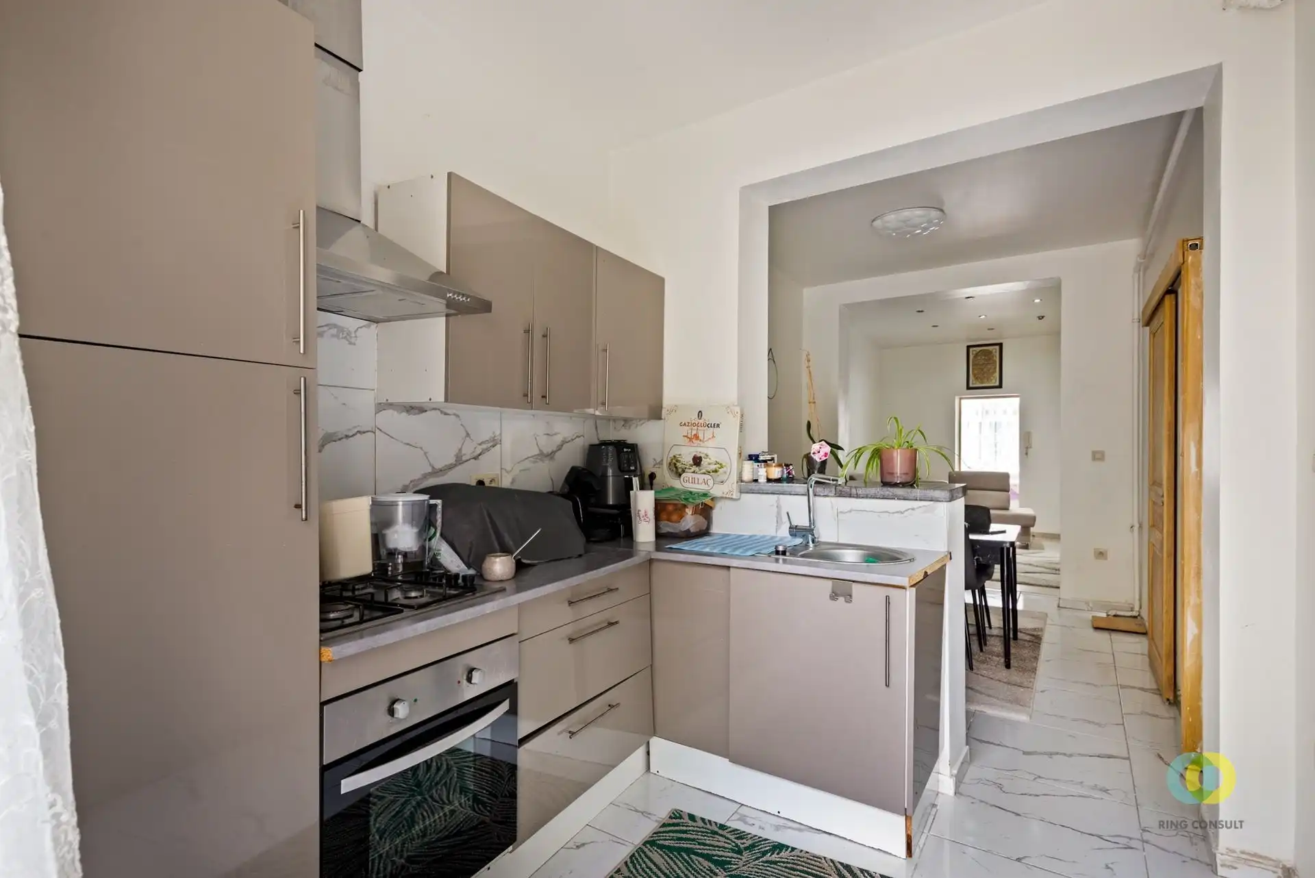 Instapklaar gelijkvloersappartement met tuin foto 2