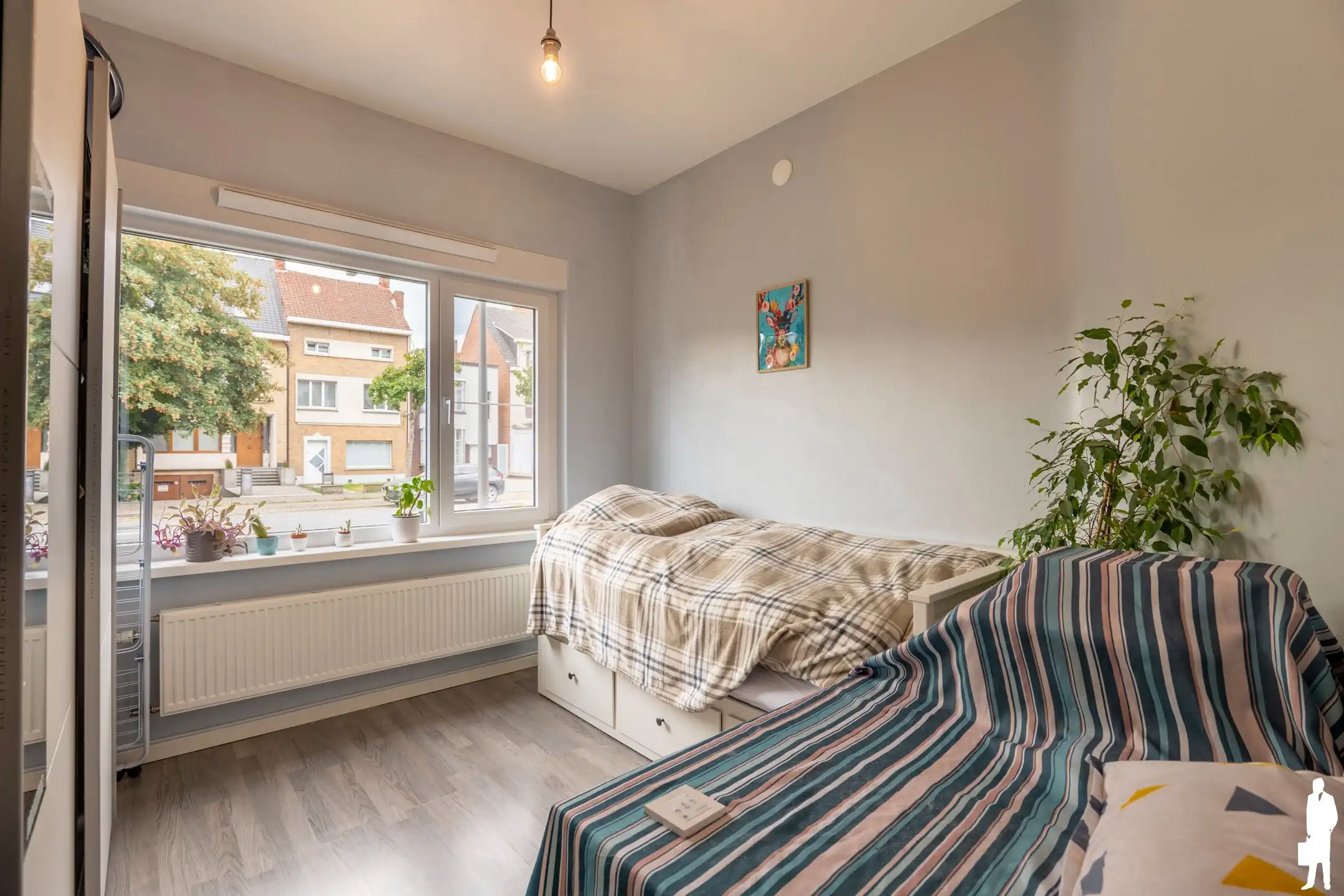 Gelijkvloers app. van ca. 110 m² met 2 slpks en staanplaats foto 13