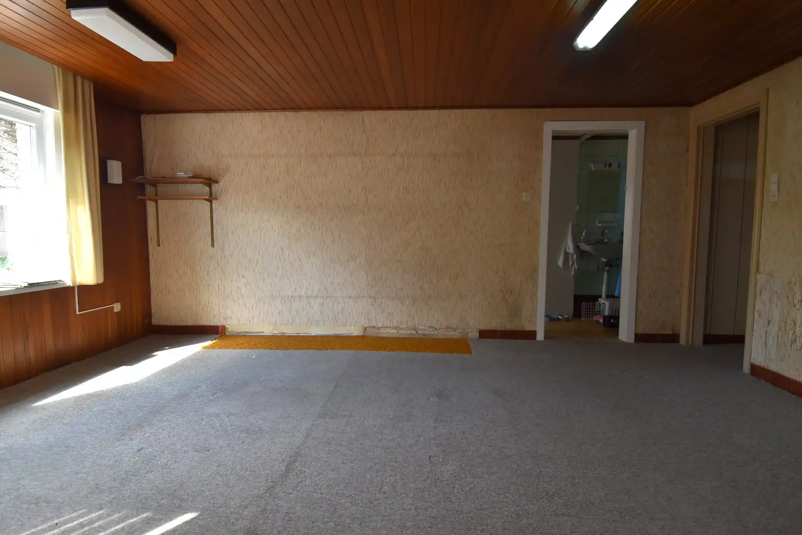 Woning met veel potentieel, garage en charmante tuin te koop in Kuurne foto 5