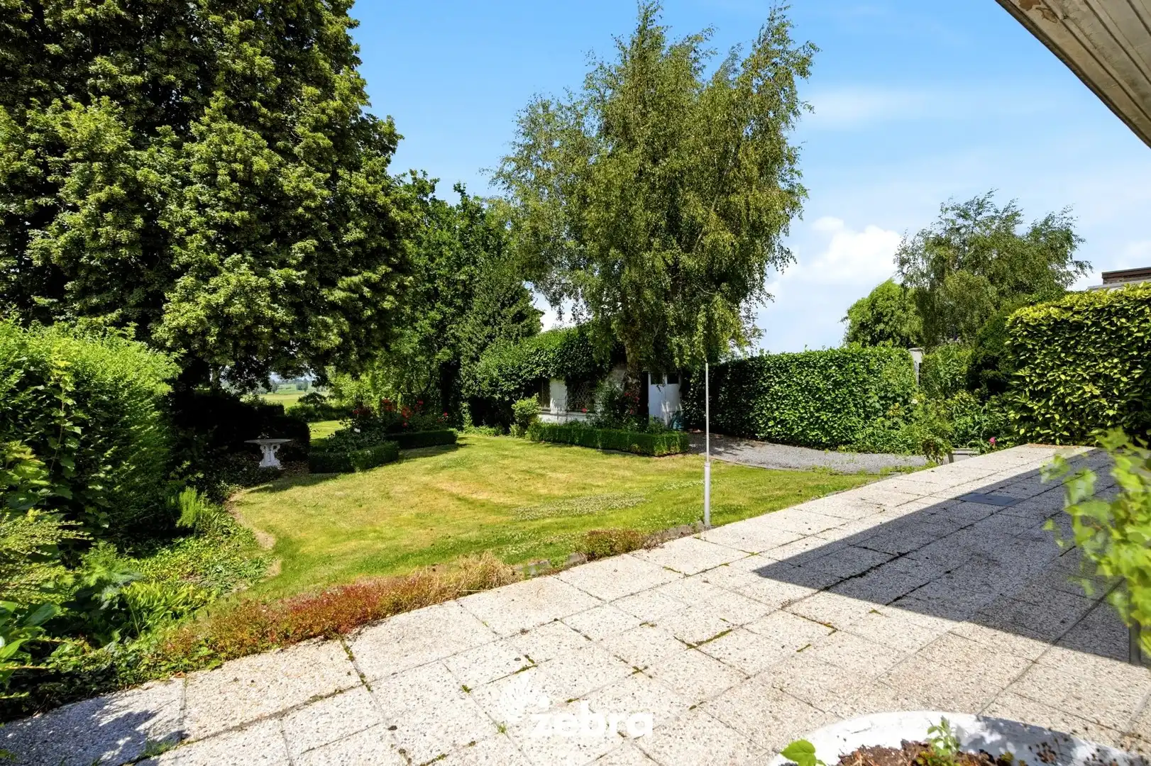 Te renoveren woning op een uitzonderlijk ruim perceel nabij het centrum van Tielt! foto 13