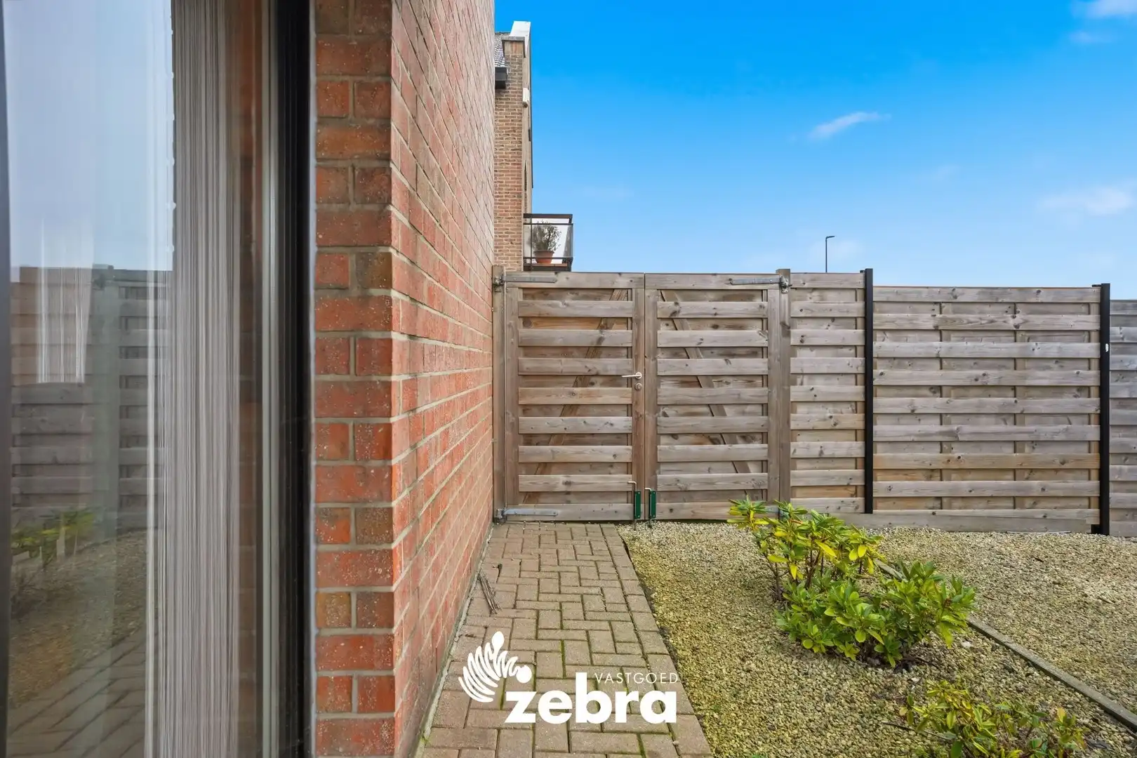 Instapklaar gelijkvloers appartement met tuin van 116 m² en garage! foto 14