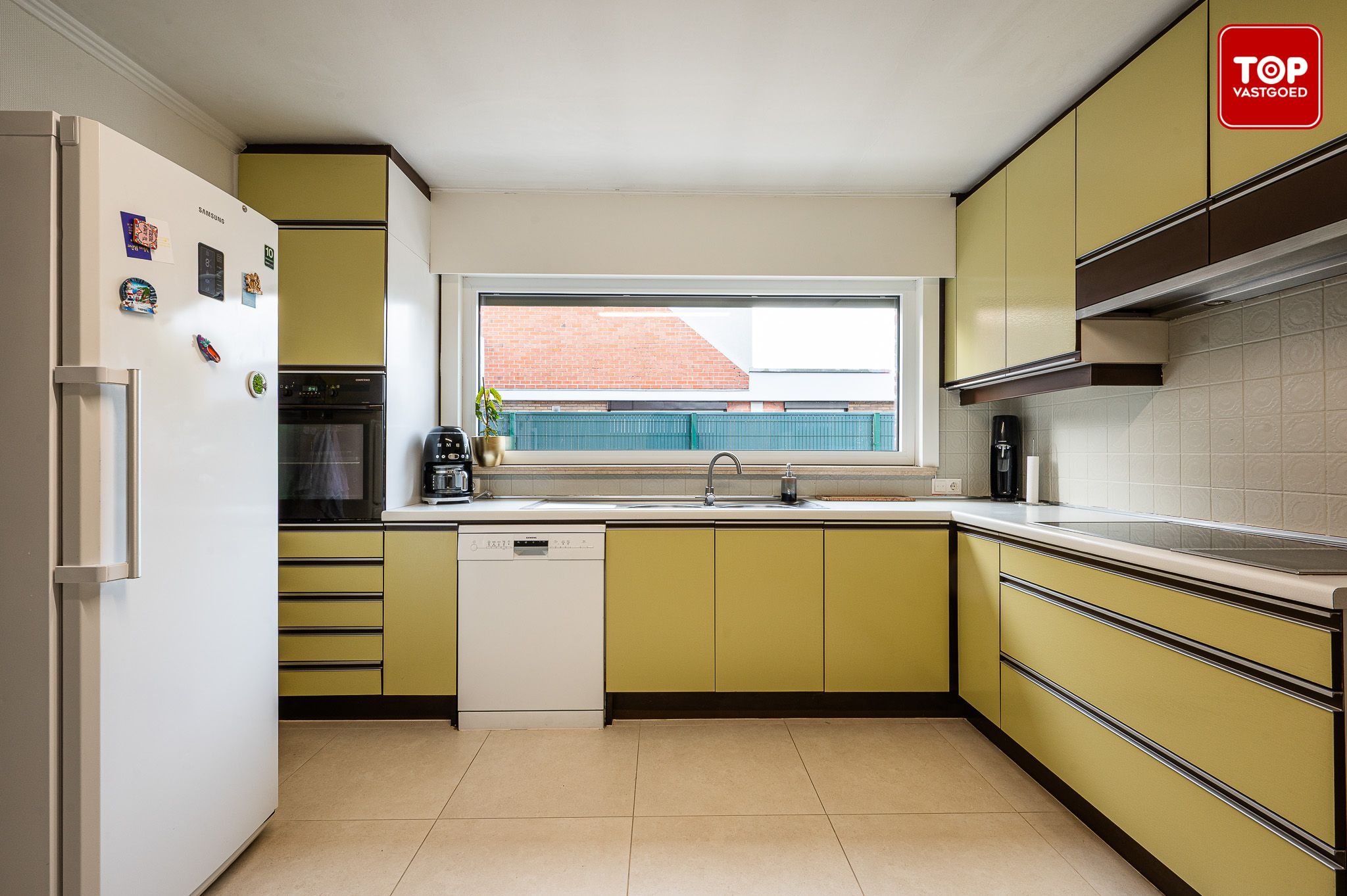 Halfopen woning met leuke tuin in centrum eeklo foto 6