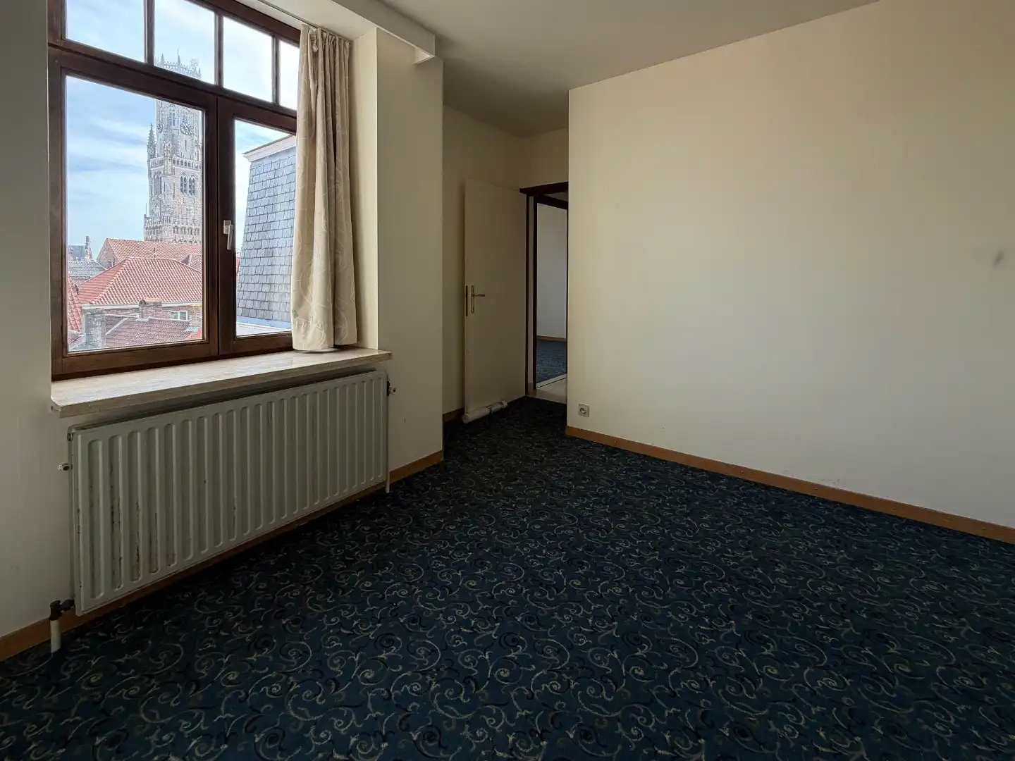 centraal gelegen appartement met prachtig zicht op de Halletoren foto 17