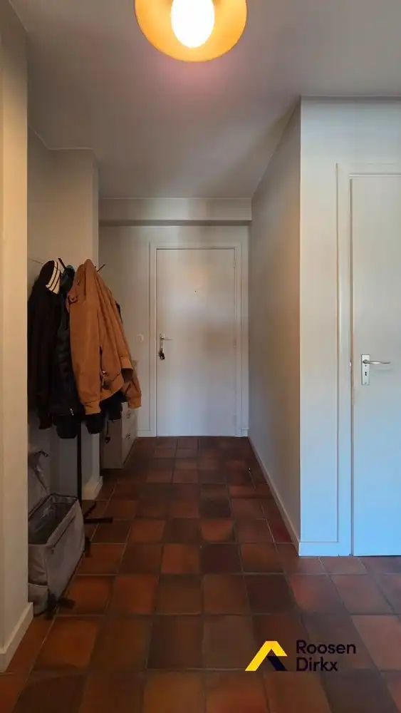 Verzorgd tweeslaapkamerappartement met parkeerplaats in centrum Bree. foto 11