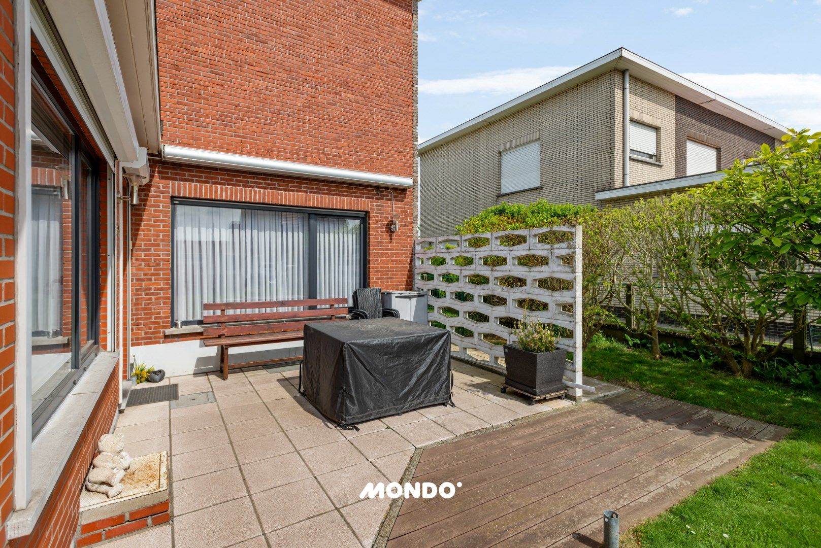 half-open bebouwing met twee garageboxen foto 3