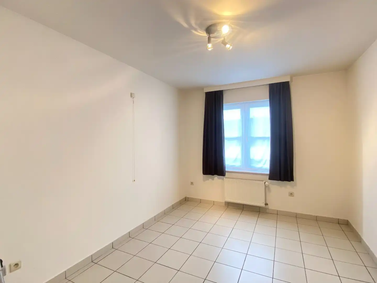 LICHTRIJK APPARTEMENT MET 2 SLAAPKAMERS EN GARAGE foto 7