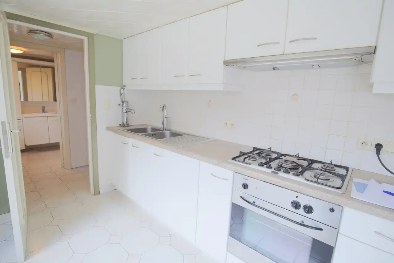 Rijwoning met terras en tuin foto 6