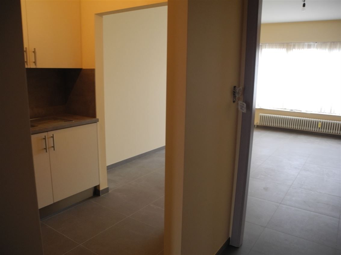Opbrengsteigendom (handel & 4 app) op toplocatie foto 52