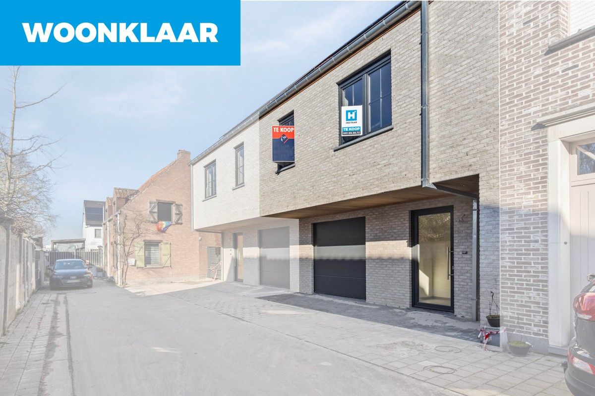 Moderne nieuwbouwwoningen met hedendaags comfort te Puurs- Sint- Amands. foto {{pictureIndex}}