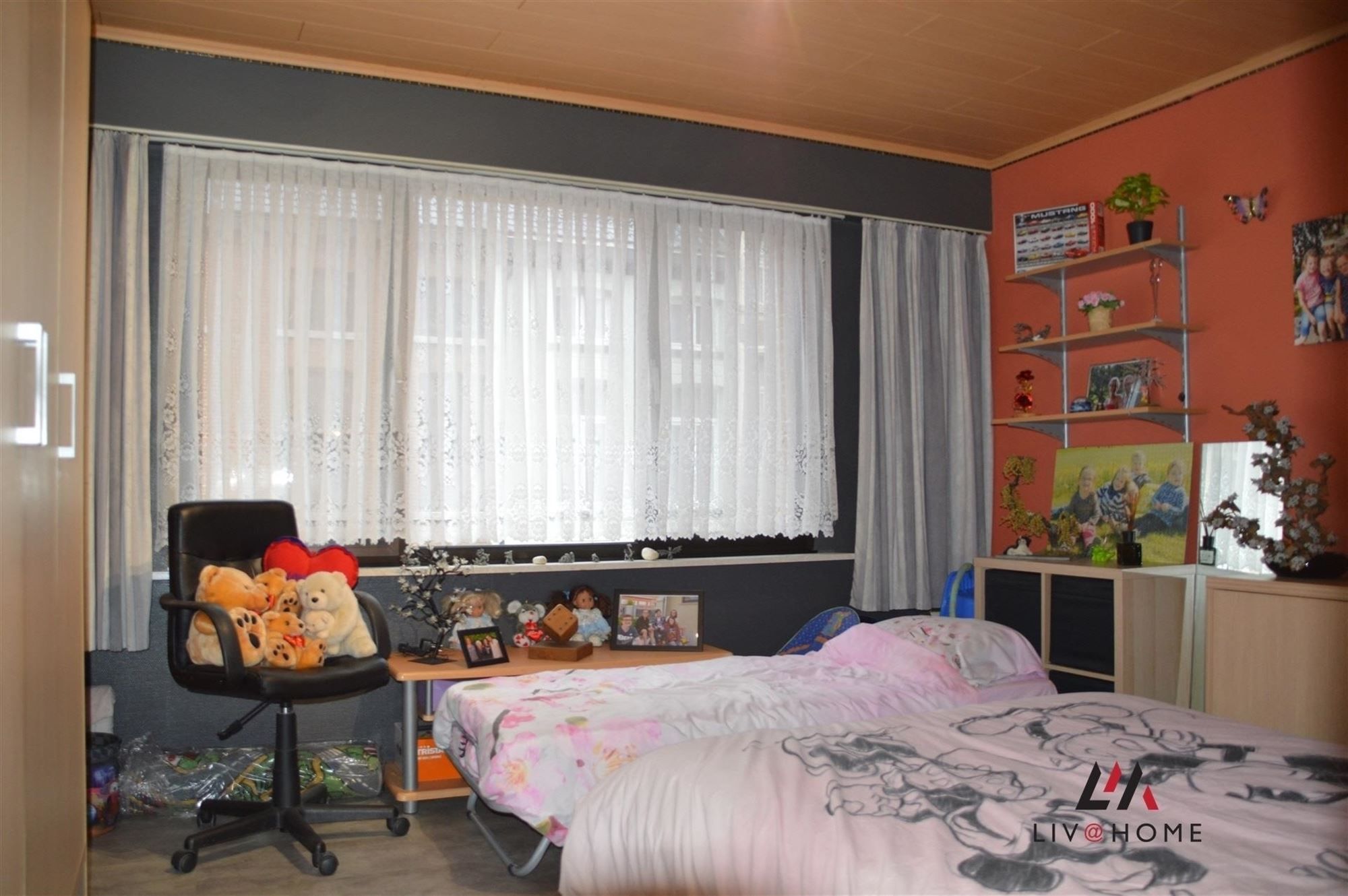 2 aangrenzende rijwoningen met gemeenschappelijke tuin foto 14