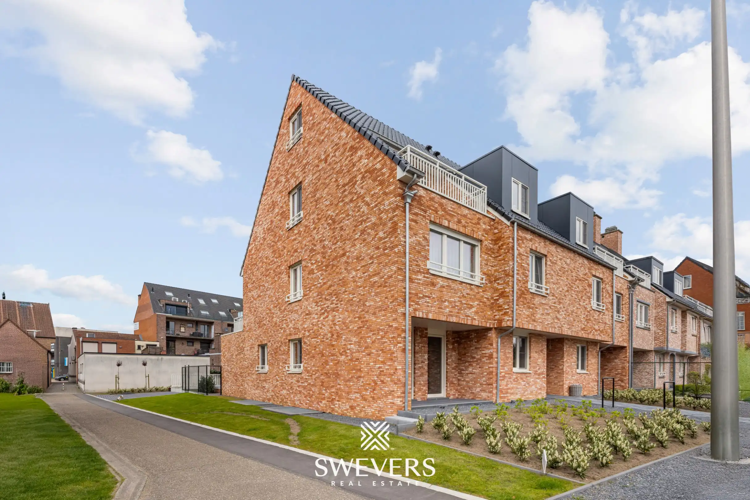 Modern gelijkvloers appartement met privétuin en dubbele parking foto 15