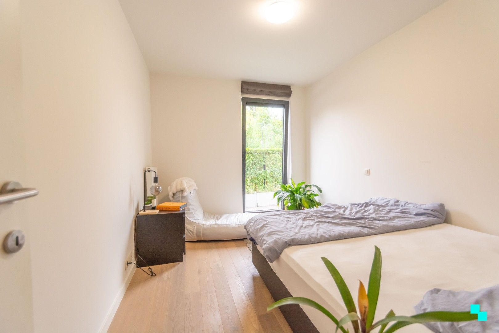 Ruim gelijkvloers appartement met tuin foto 12