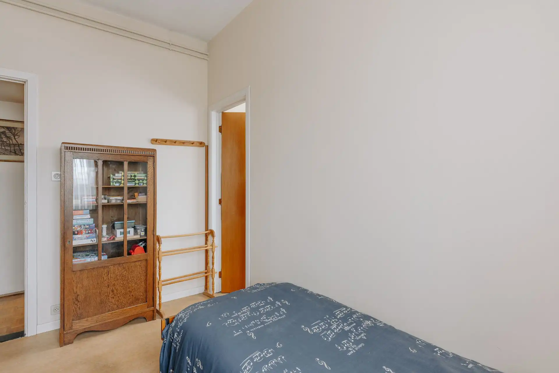 Ruim 3-slaapkamerappartement met karakter en autostaanplaats foto 17