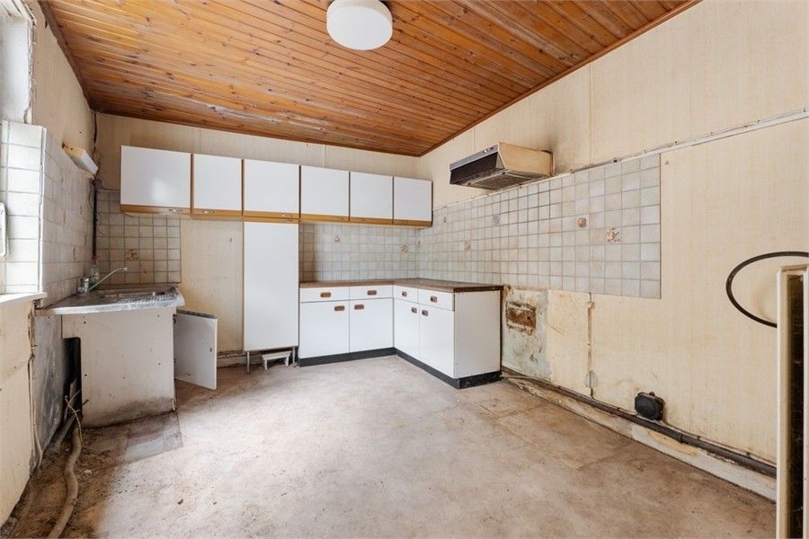 TE RENOVEREN STADSWONING MET VEEL POTENTIEEL IN HET STADSCENTRUM VAN SINT-TRUIDEN foto 14