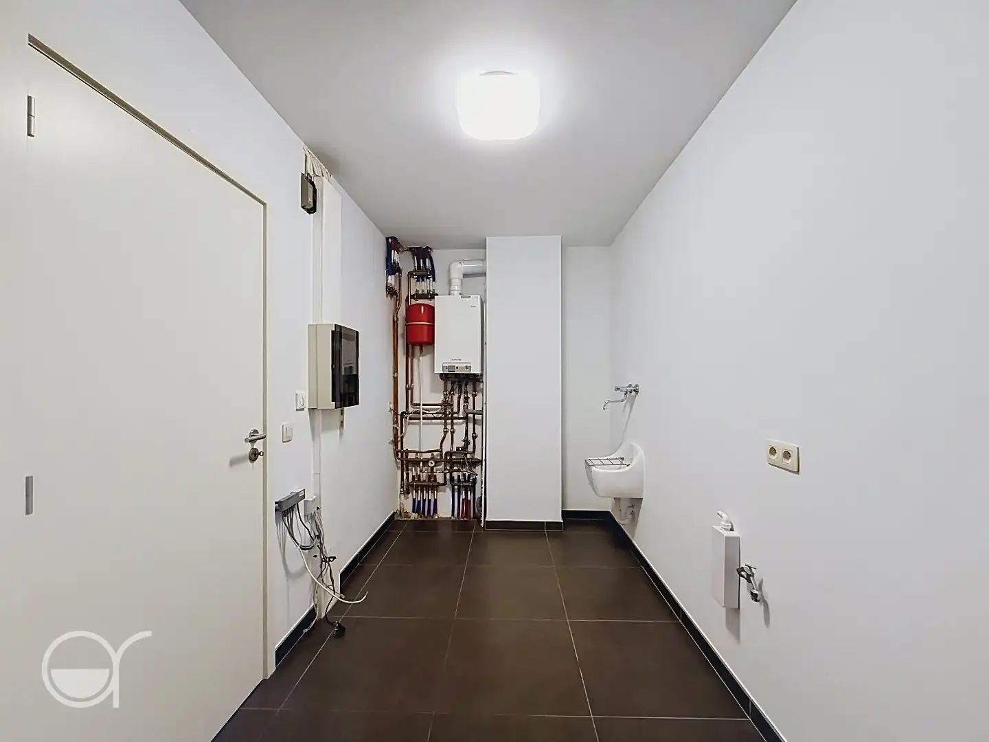 Lichtrijk duplexappartement met 2 slaapkamers, terras, garagebox én staanplaats foto 8
