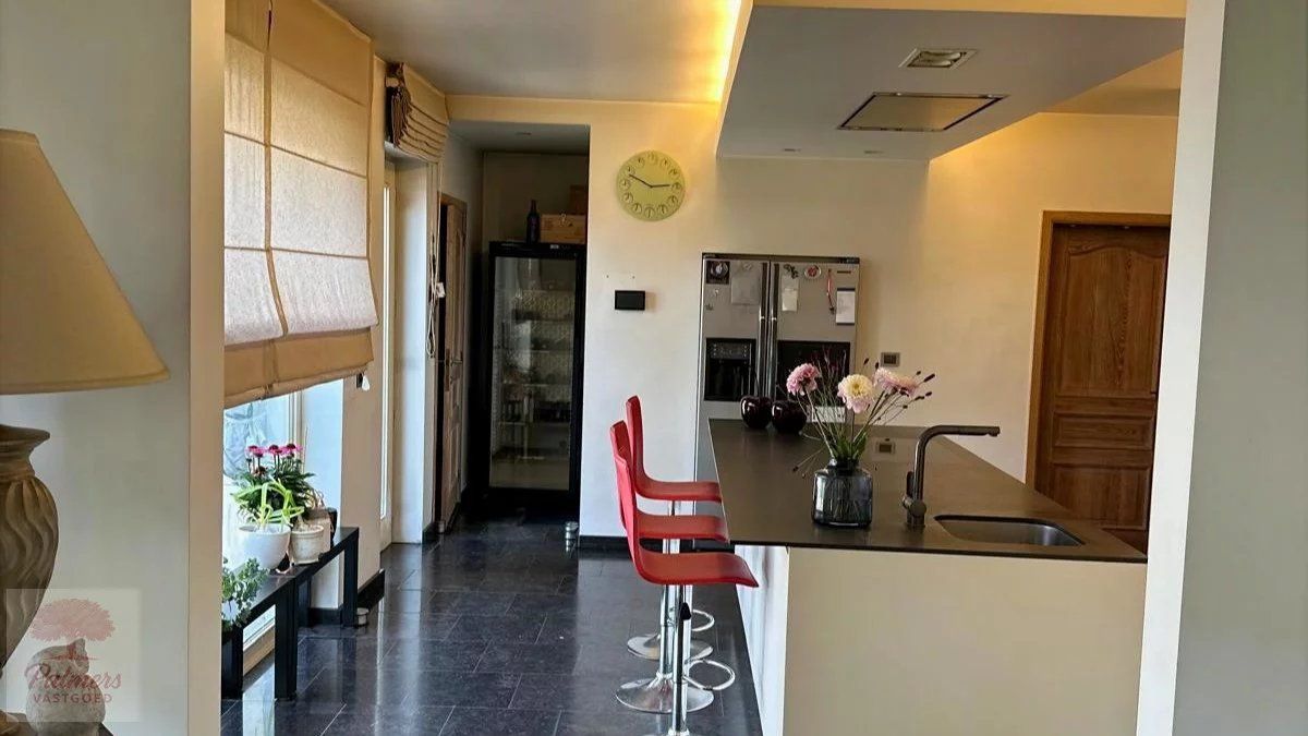 Discreet gelegen villa met karakter en comfort in hartje Alken foto 10