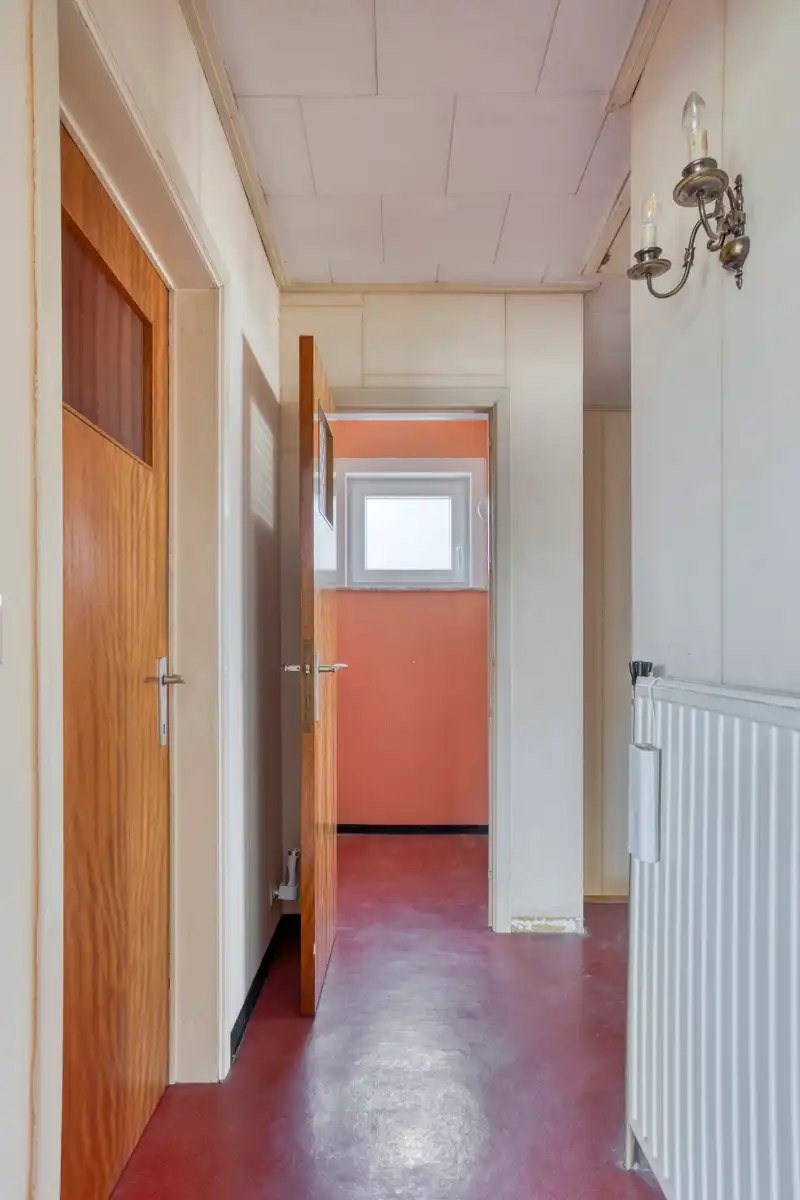 Te renoveren open bebouwing met zuidgerichte tuin foto 16