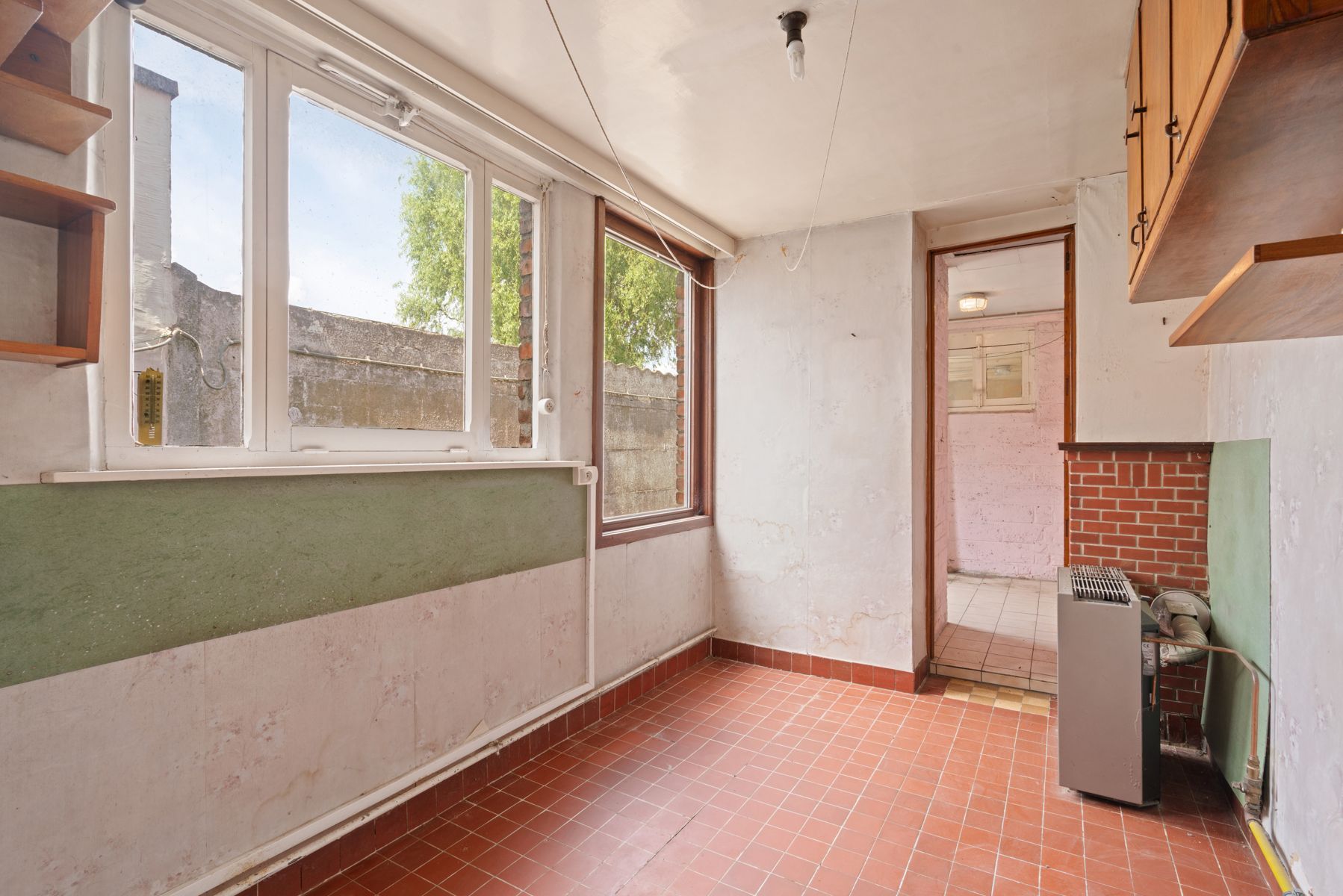 Te renoveren woning met tuin in Gentbrugge foto 8