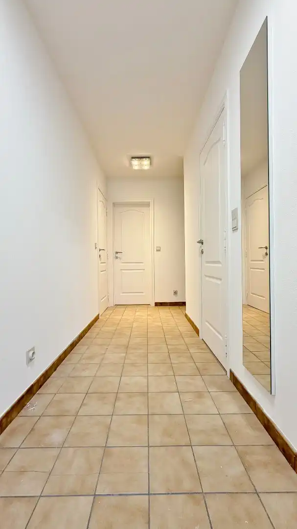Ruim en lichtrijk appartement met garage, terras en open zicht foto 2
