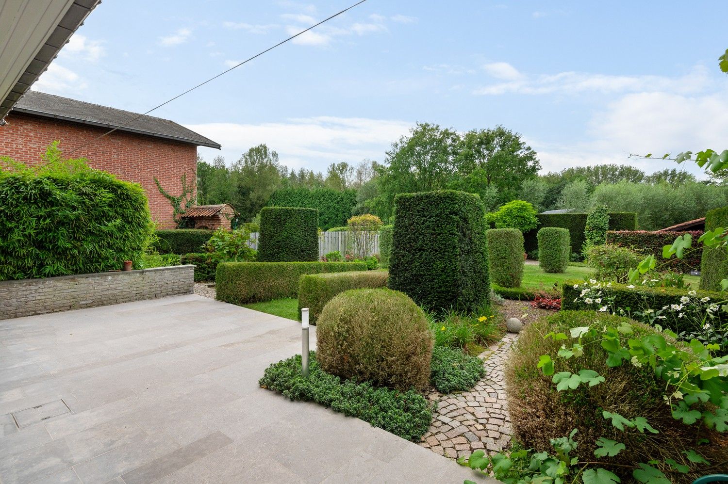 Prachtig onderhouden laagbouwwoning met drie slaapkamers op een perceel (W) van 1.000 m²! foto 19