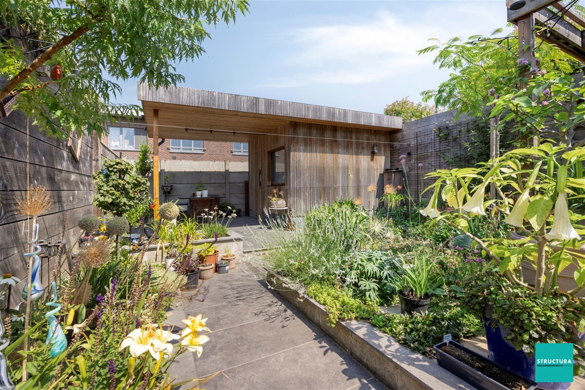 Instapklare woning met prachtige tuin foto 19