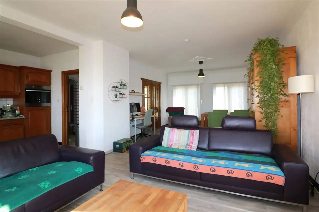 Gusting gelegen woning met 2 slpk, garage en tuin foto 6