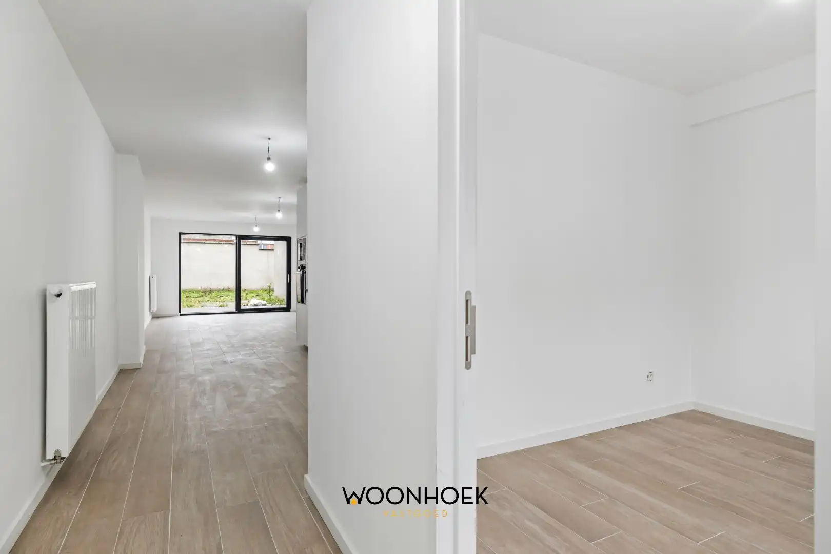 Gerenoveerde, 6-slpk woning, zonnige tuin en 2 bdkms te Sint-Niklaas! foto 11