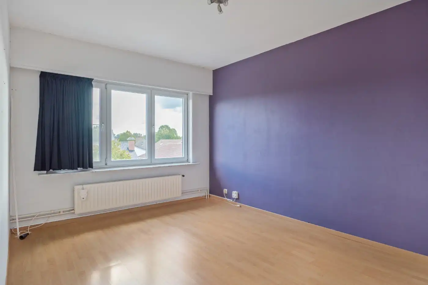 Ruime, instapklare bel-etagewoning met 3 slpk., inpandige garage en tuin foto 14